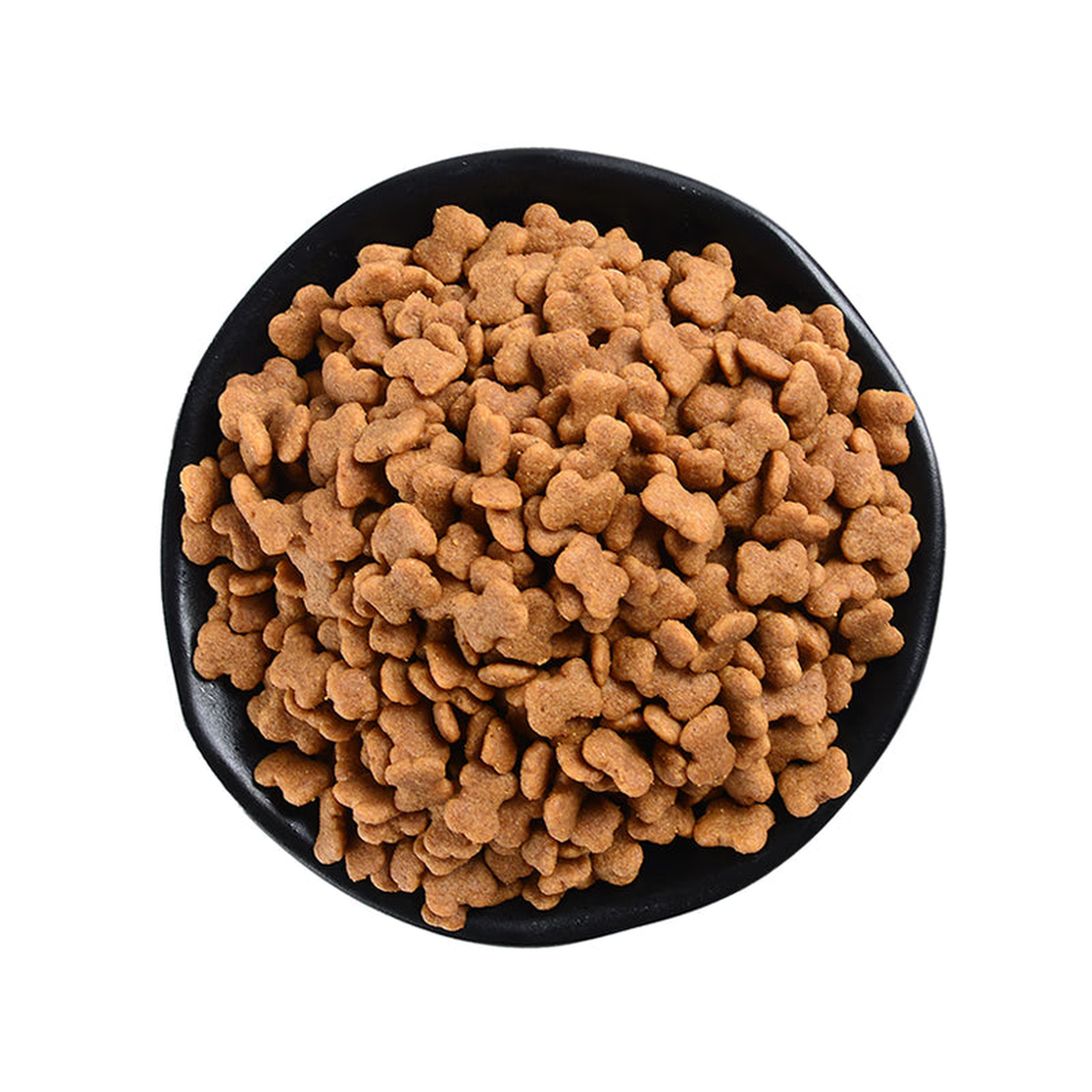 Close-up of brown, bone-shaped dry dog food kibble in a black bowl on a white background.
